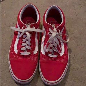 a pair of red vans